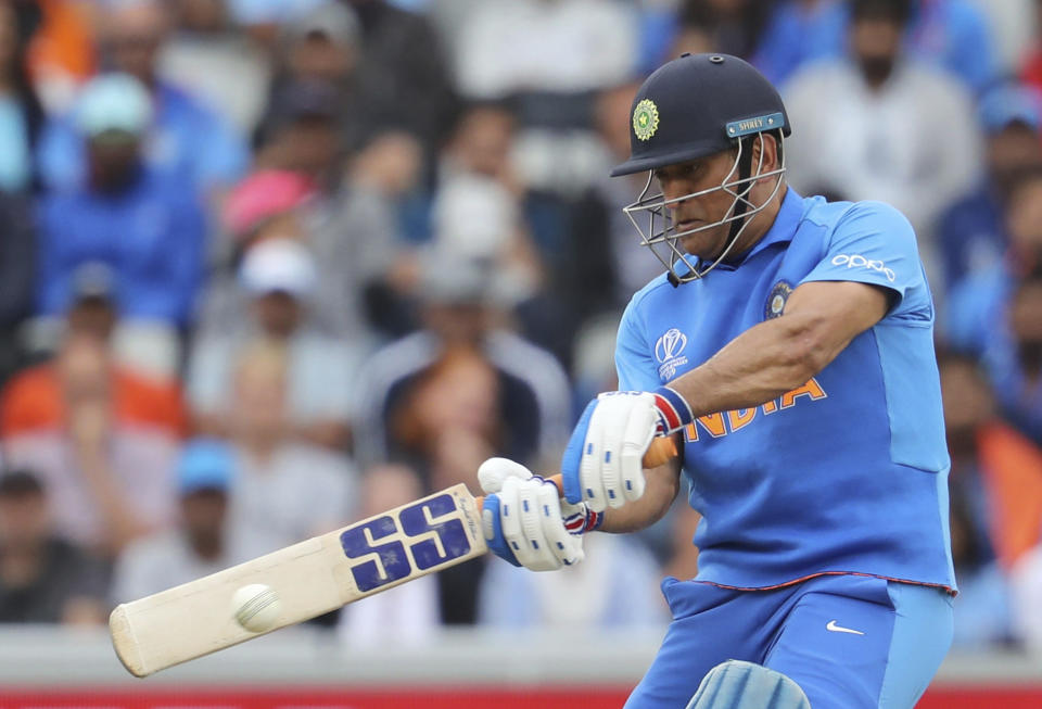 India's Mahendra Singh Dhoni bats during the Cricket World Cup semifinal match between India and New Zealand at Old Trafford in Manchester, Wednesday, July 10, 2019. (AP Photo/Rui Vieira)