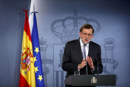 Spanish acting Prime Minister Mariano Rajoy addresses a news conference after meeting with Catalan President Carles Puigdemont (not pictured) at the Moncloa Palace in Madrid, Spain, April 20, 2016. REUTERS/Susana Vera