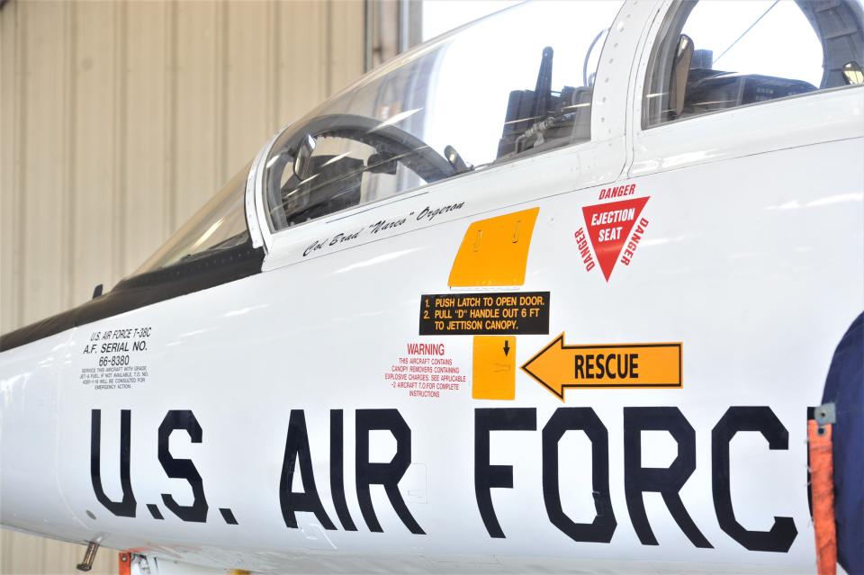 Colonel Brad Orgeron has his name newly displayed on the side of the jet in the 80th Flying Training Wing hanger during the 80th Flying Training Wing Change of Command ceremony at Sheppard Air Force Base in Wichita Falls on Friday, June 24, 2022.