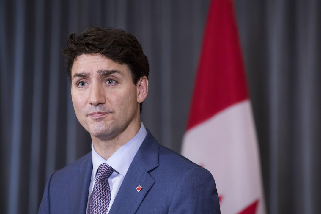 Canadian Prime Minister Justin Trudeau talks to journalists during press conference after the 33rd ASEAN Summit in Singapore, Thursday, Nov. 15, 2018. (AP Photo/Bernat Armangue)