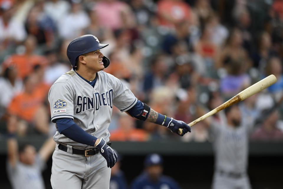 San Diego Padres' Manny Machado watches his home run during the third inning of a baseball game against the Baltimore Orioles, Tuesday, June 25, 2019, in Baltimore. (AP Photo/Nick Wass)