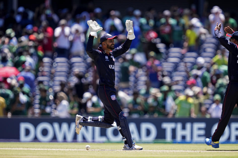 United States' captain Monank Patel, left, celebrates after their win in the ICC Men's T20 World Cup cricket match against Pakistan at the Grand Prairie Stadium in Grand Prairie, Texas, Thursday, June 6, 2024. (AP Photo/Tony Gutierrez)