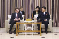 Oleg Kozhemyako, left, Russia's governor of the Maritime Territory Administration, speaks with Ji Kyong Su, North Korea's vice minister of External Economic Relations, after Kozhemyako arrived at the Pyongyang International airport in Pyongyang, North Korea, Monday, Dec. 11, 2023. (AP Photo/Jon Chol Jin)