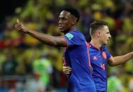 Soccer Football - World Cup - Group H - Poland vs Colombia - Kazan Arena, Kazan, Russia - June 24, 2018 Colombia's Yerry Mina celebrates scoring their first goal with Santiago Arias REUTERS/Toru Hanai