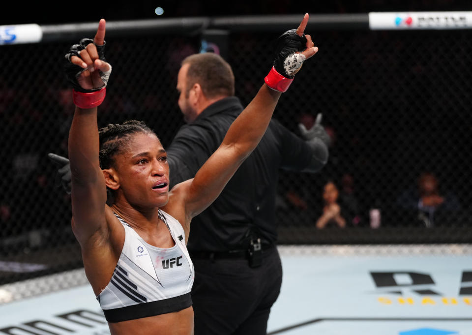 Angela Hill reacts after the conclusion of her strawweight fight against Emily Ducote at a UFC Fight Night event on Dec. 03, 2022. (Jeff Bottari/Zuffa LLC)