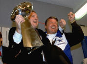 FILE - In this Jan. 31, 1993, file photo, Dallas Cowboys head coach Jimmy Johnson, right, and owner Jerry Jones, hold up the Vince Lombardi Trophy as they celebrate their 52-17 win over the Buffalo Bills in Super Bowl XXVII in Pasadena, Calif. As Jimmy Johnson looks back on the rocky relationship that abruptly ended his championship run with the Dallas Cowboys, he can laugh now. He’s heading into the Pro Football Hall of Fame. For Cowboys owner Jerry Jones, the emotions are more complicated. (AP Photo/Rick Bowmer, File)