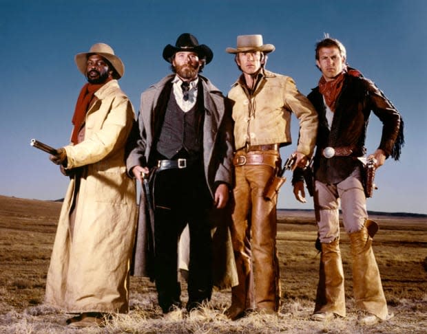 <p>Danny Glover, Kevin Kline, Scott Glenn and Kevin Costner on the set of <em>Silverado,</em> written and directed by Lawrence Kasdan. </p>