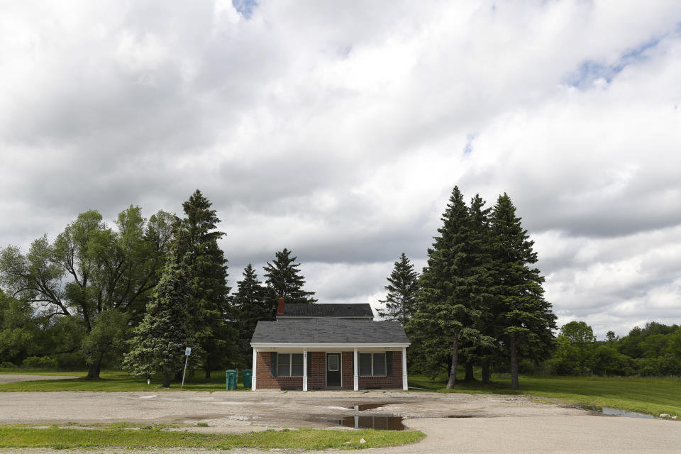 The current headquarters of Opus Bono Sacerdotii is shown in Dryden, Mich., Wednesday, June 5, 2019. For nearly two decades, the small nonprofit organization, operating out of a series of unmarked buildings in rural Michigan, has provided money, shelter, transport, legal help and other support to priests accused of sexual abuse. (AP Photo/Paul Sancya)