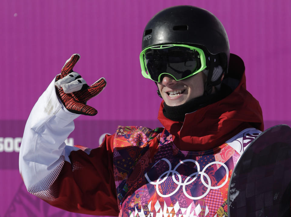 Canada's Maxence Parrot reacts after a run during the men's snowboard slopestyle qualifying at the Rosa Khutor Extreme Park ahead of the 2014 Winter Olympics, Thursday, Feb. 6, 2014, in Krasnaya Polyana, Russia. (AP Photo/Andy Wong)