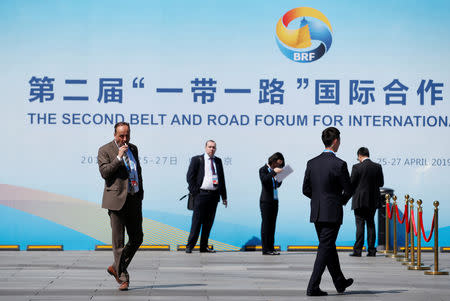Delegates rest outside the China National Convention Center, the venue for the Belt and Road Forum, in Beijing, China, April 25, 2019. REUTERS/Jason Lee