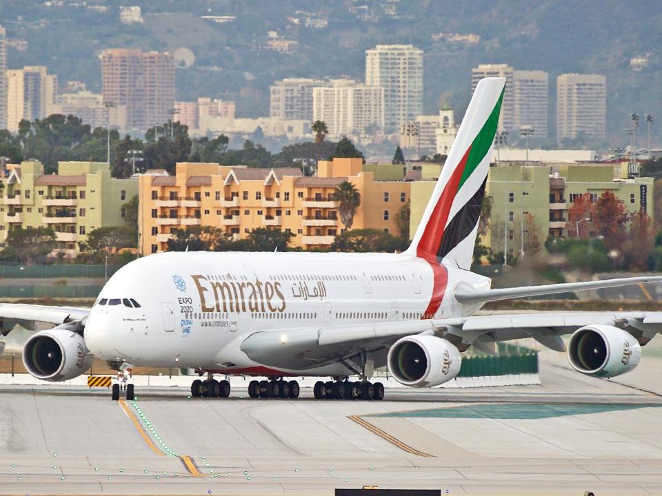 Emirates and American Airlines planes