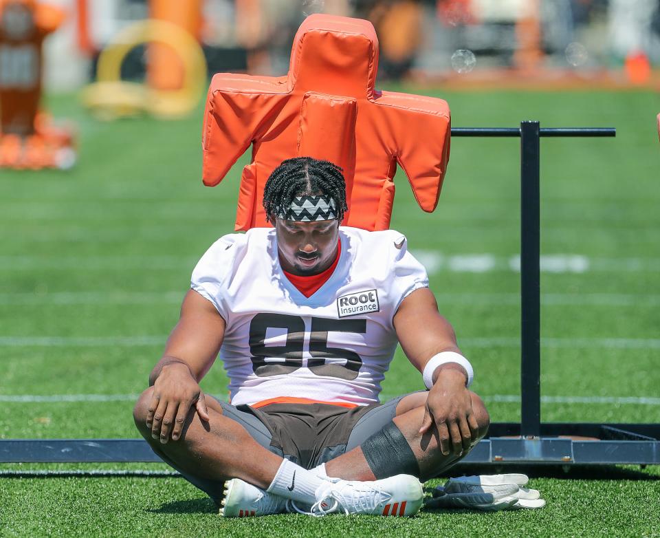 Cleveland Browns defensive end Myles Garrett spends a quiet moment alone before training camp on Saturday, July 30, 2022 in Berea.