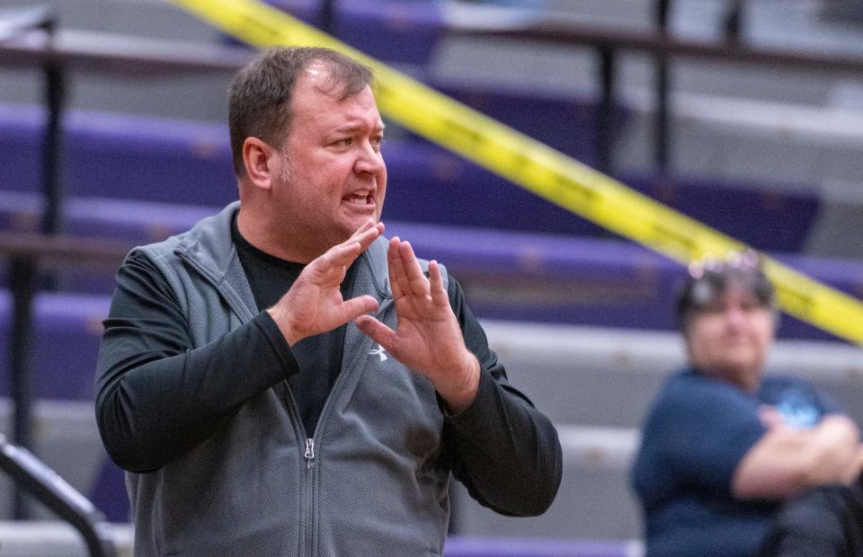 Danville High School head coach Brian Barber reacts to action on the court during the first half of an IHSAA Boys’ Regional Basketball championship game against Beech Grove High School, Saturday, March 12, 2022, at Greencastle High School.