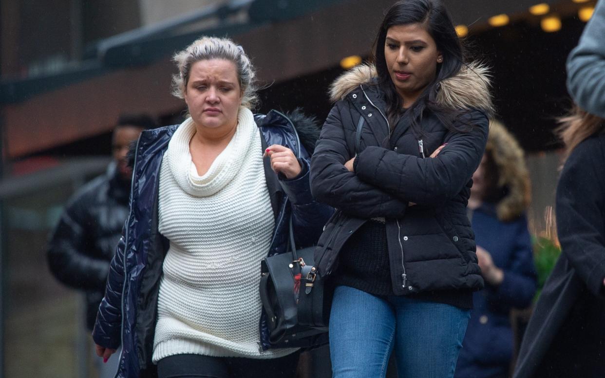 Abana Arshad (right), 23, and Amy Greenhalgh, 24, filmed themselves throwing stones and rolled up gloves at vulnerable, elderly care home residents - Cavendish Press (Manchester) Ltd