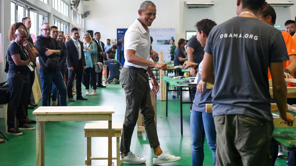 When former US president Barack Obama wore Stan Smiths at an event in Kuala Lumpur in 2019, his casual style was praised as on-trend and refreshing. - Mohd Rasfan/AFP/Getty Images