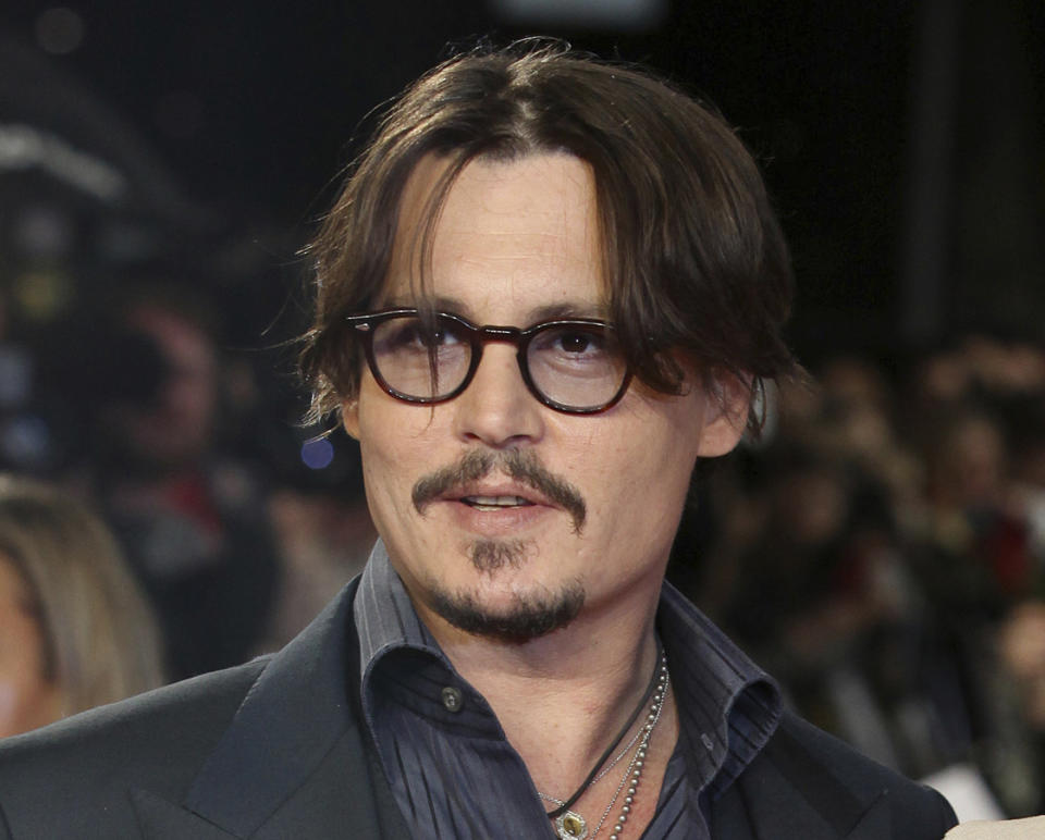 FILE - Actor Johnny Depp appears for the European premiere of their film, "The Rum Diary," in London on Nov. 3, 2011. The historical drama, “Jeanne du Barry,” starring Depp as King Louis XV, will open the 76th Cannes Film Festival. (AP Photo/Joel Ryan, File)