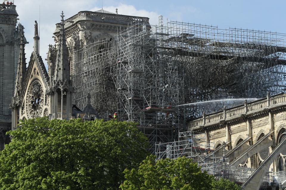 A closeup view of Notre-Dame's most severely damaged sections. A makeshift roof must be temporarily installed and relics and artworks moved elsewhere for safekeeping.