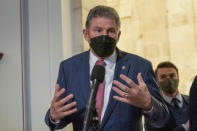 Sen. Joe Manchin, D-WVa., speaks to the media after senate democrats luncheon, on Capitol Hill in Washington, Thursday, Jan. 13, 2022. Biden is meeting privately with Senate Democrats at the Capitol, a visit intended to deliver a jolt to the party's long-stalled voting and elections legislation. ( AP Photo/Jose Luis Magana)