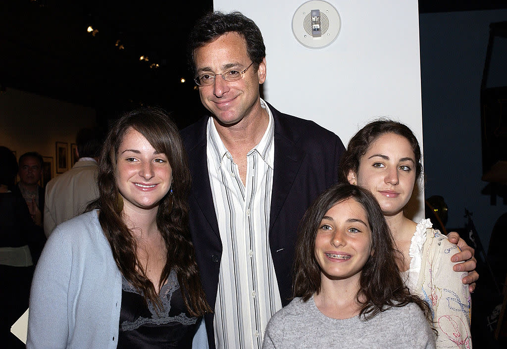 Bob Saget and his now adult daughters — Lara, Aubrey and Jennie — pose on the red carpet on June 15, 2005 in Los Angeles. (Photo: Amanda Edwards/Getty Images)
