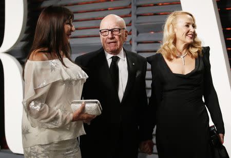 FILE PHOTO - 89th Academy Awards - Oscars Vanity Fair Party - Beverly Hills, California, U.S. - 26/02/17 – Actress Anjelica Huston, media mogul Rupert Murdoch and model Jerry Hall. REUTERS/Danny Moloshok