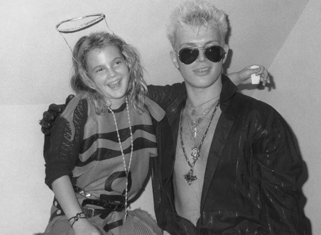 Actress Drew Barrymore and singer Billy Idol at nightclub Limelight, New York City, US, 1986. (Photo by Vinnie Zuffante/Micheal Ochs Archives/Getty Images)