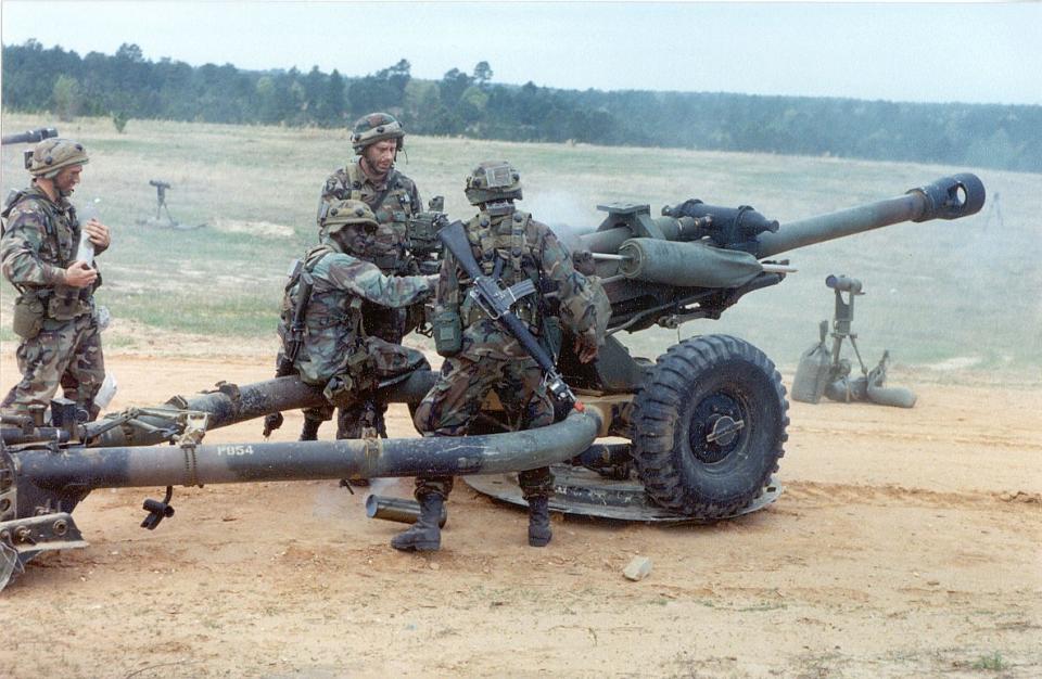 Army soldiers M119 howitzer