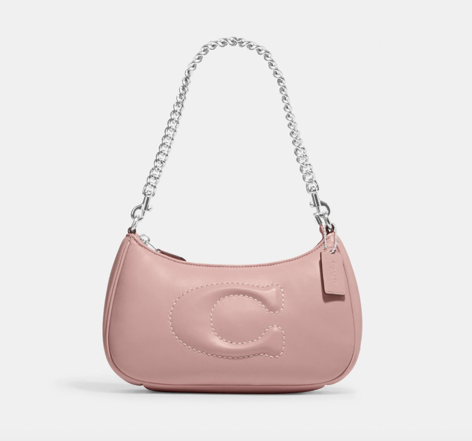 Teri Shoulder Bag With Signature Quilting in light pink (photo via Coach Outlet)
