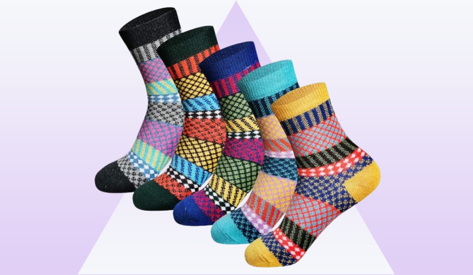 Five woolen socks with different patterns.