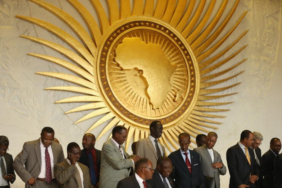 Delegates arrange themselves for a group picture during a visit by the German president at the headquarters of the African Union (AU) on March 18, 2013 in Addis Ababa, Ethiopia. (Photo by Sean Gallup/Getty Images)