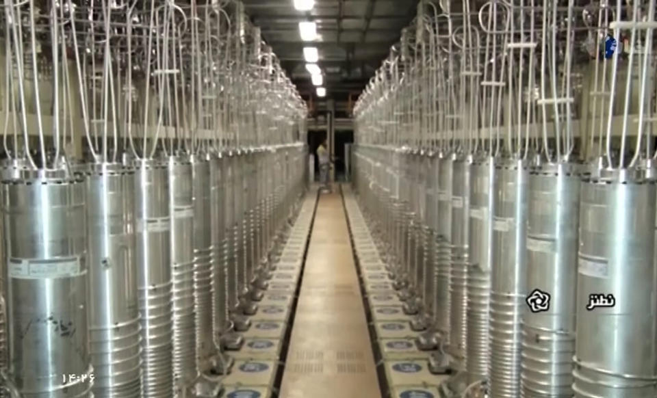 In this image made from April 17, 2021, video released by the Islamic Republic Iran Broadcasting, IRIB, state-run TV, various centrifuge machines line the hall damaged on Sunday, April 11, 2021, at the Natanz Uranium Enrichment Facility, some 200 miles (322 km) south of the capital Tehran, Iran. Iran named a suspect Saturday in the attack on its Natanz nuclear facility that damaged centrifuges there, as Reza Karimi and said he had fled the country "hours before" the sabotage happened. (IRIB via AP, File)