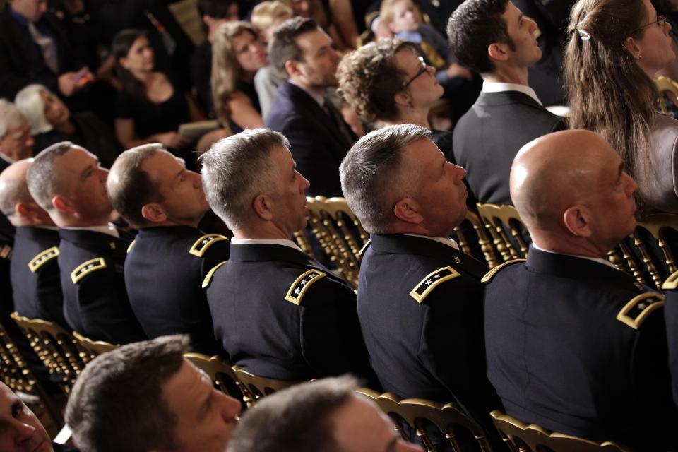 U.S. Army Generals sit in the crowd at a Medal of Honor award ceremony for former Army Captain William Swenson at the White House in Washington