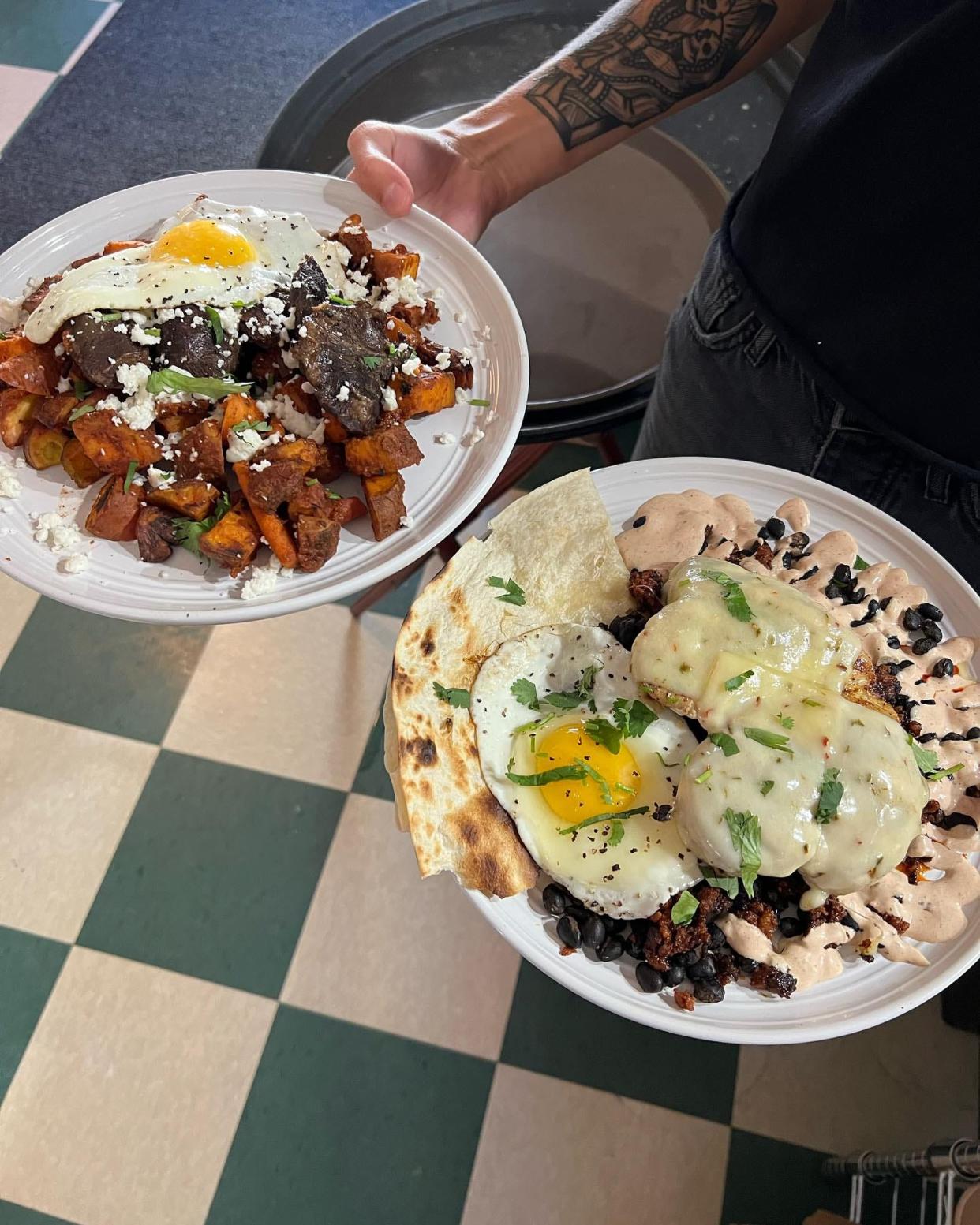 The Sandspur restaurant at 103 S. Lake Park Blvd in Carolina Beach offers brunch specials like this pork cheek hash and a chorizo-chicken dish with eggs.