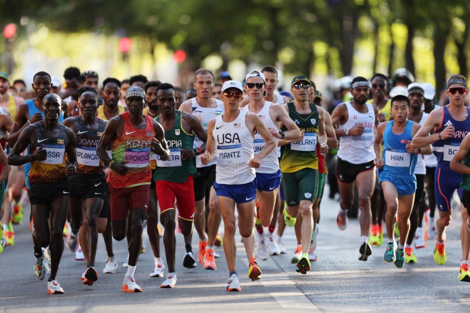 Eliud Kipchoge of Kenya at the front of the field during the race (REUTERS)