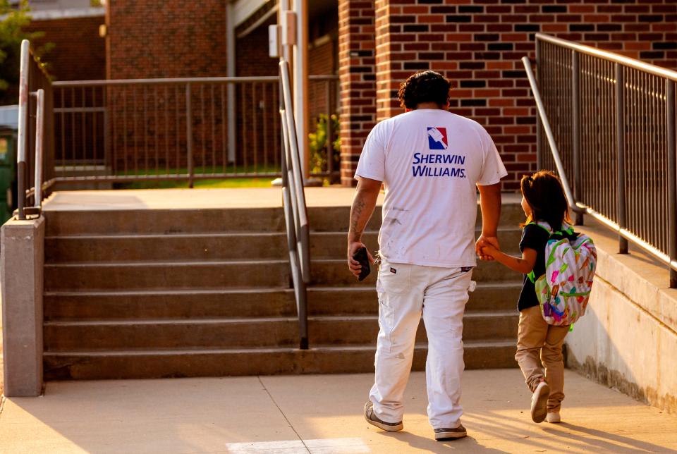 Parents and students arrive at Rockwood Elementary in Oklahoma City for school Aug. 9, 2021.