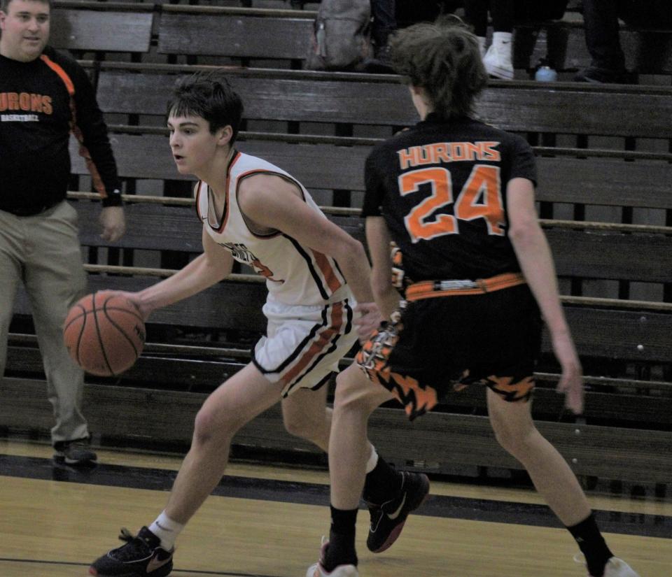 Cheboygan freshman guard Gavin Smith (left) has been a major contributor for the Chiefs and one of the top young players in the area so far this season.