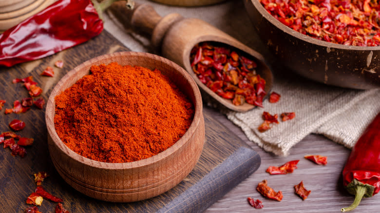 bowls of powdered and flaked chili