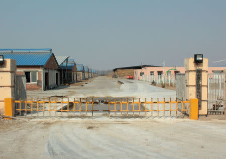 Gate of a Huishan Dairy farm is seen in Shenyang, Liaoning province, China, March 30, 2017. Picture taken March 30, 2017. REUTERS/Jake Spring