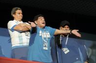 <p>Football legend star Diego Maradona waves to the fans ahead of the group D match between Argentina and Nigeria </p>