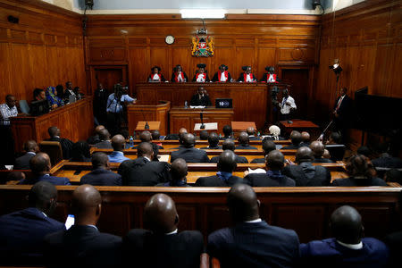 Kenya's Supreme Court judges arrive at the court room before delivering a ruling on cases that seek to nullify the re-election of President Uhuru Kenyatta last month in Kenya's Supreme Court in Nairobi, Kenya November 20, 2017. REUTERS/Baz Ratner