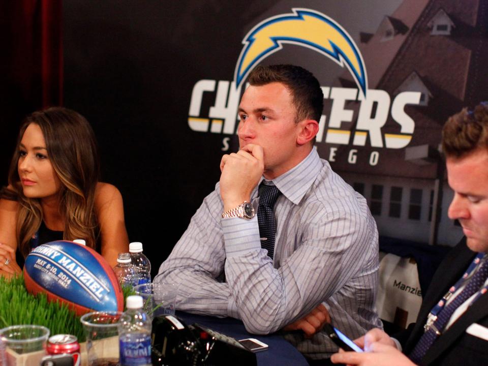 Johnny Manziel waits to hear his name called at the NFL Draft.