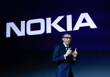 Rajeev Suri, Nokia's President and Chief Executive Officer, speaks during the Mobile World Congress in Barcelona, Spain February 25, 2018. REUTERS/Yves Herman