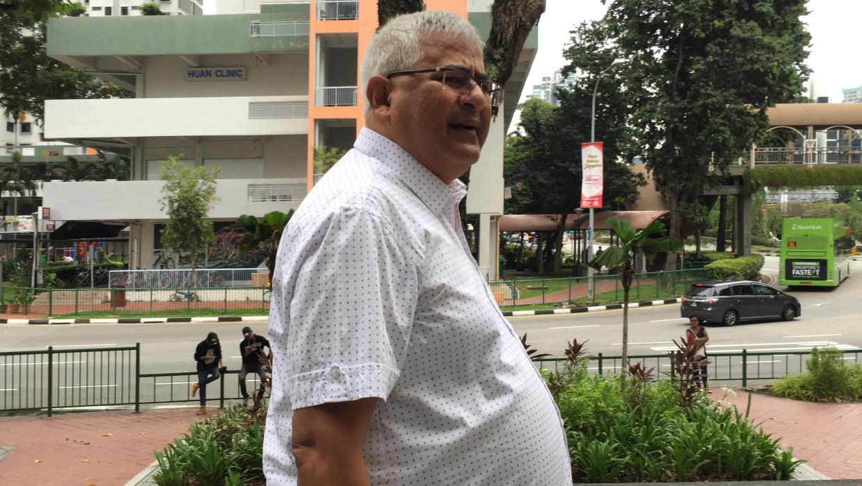 Kirpa Ram Sharma leaving the State Courts on Wednesday (5 September). (PHOTO: Abdul Rahman Azhari/Yahoo News Singapore)