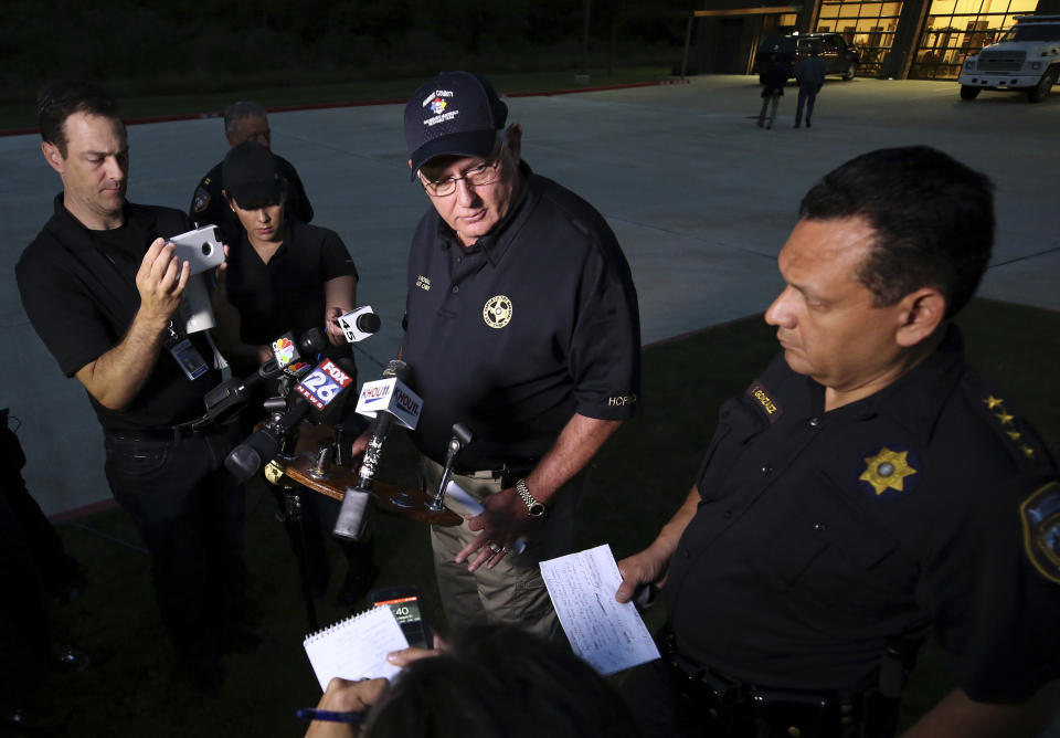 <p>Harris County Fire Marshal Assistant Chief Bob Royall, center, and Harris County Sheriff Ed Gonzalez speak about the explosion of organic peroxides at the Arkema chemical plant during a press conference outside the Crosby Fire Department Thursday, Aug. 31, 2017, in Crosby, Texas. Fifteen Harris County Sheriff Office deputies that first responded to the fire at the plant were sent to the hospital. (Photo: Godofredo A. Vasquez/Houston Chronicle via AP) </p>