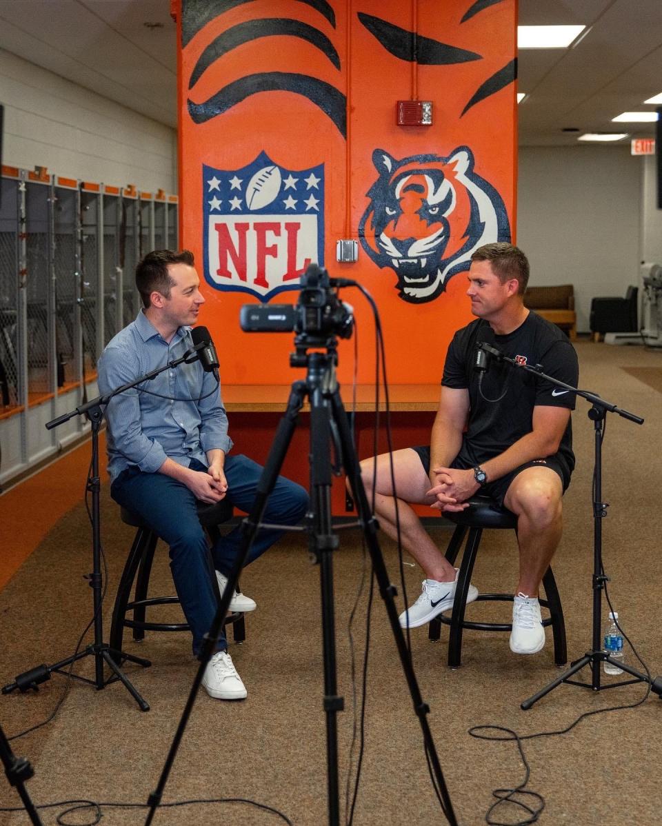Brandon Saho interviews Cincinnati Bengals Coach Zac Taylor on "The Mental Game," a mental health podcast created by Saho after his own struggles with mental wellness. Taylor is one of many high-profile guests to appear on the podcast since it first aired.