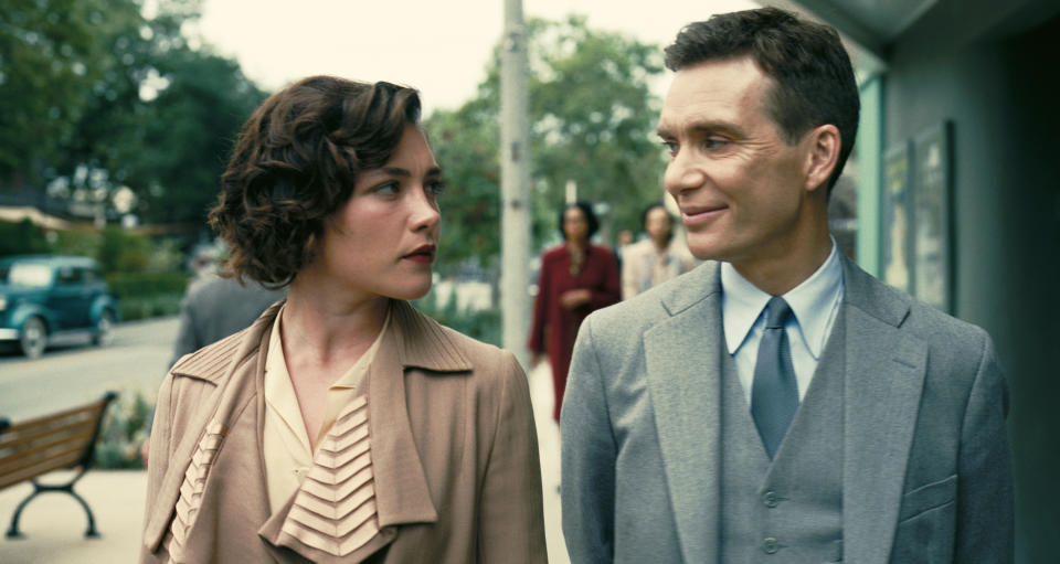 This image released by Universal Pictures shows Florence Pugh as Jean Tatlock, left, and Cillian Murphy as J. Robert Oppenheimer in a scene from "Oppenheimer." (Melinda Sue Gordon/Universal Pictures via AP)