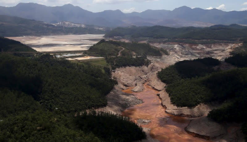 FILE PHOTO: General view from above of a dam owned by Vale SA and BHP Billiton Ltd that burst, in Mariana