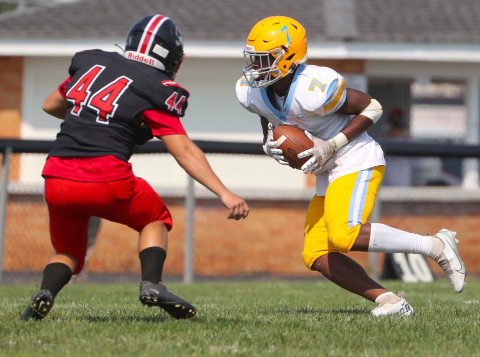 Cape Henlopen's Maurki James (7) looks to get past William Penn's Franklin Morris in the first quarter at William Penn High School, Saturday, Sept. 17, 2022.