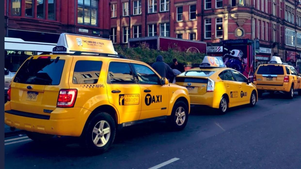 New York's iconic yellow taxis made an appearance in Manchester on Tuesday. Pic: Twitter/Kalpesh