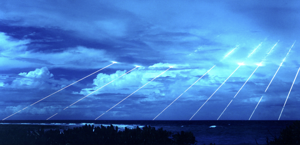 A time-lapse shot showing MIRVs re-entering the atmosphere during a test of the LGM-118A Peacekeeper missile. <em>U.S. Army</em>