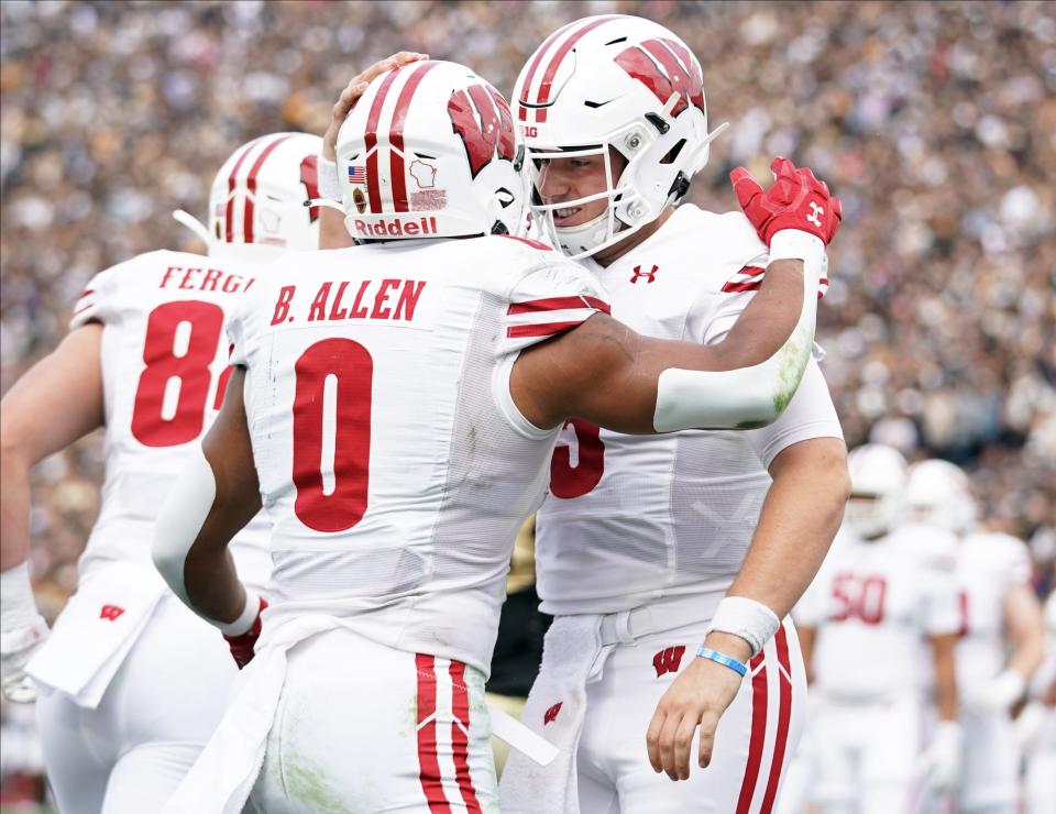 Wisconsin Badgers running back Braelon Allen (0) and quarterback Graham Mertz (5) are two of the team's returning starters.